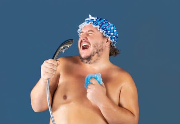 Man singing in shower for best bluetooth shower speakers